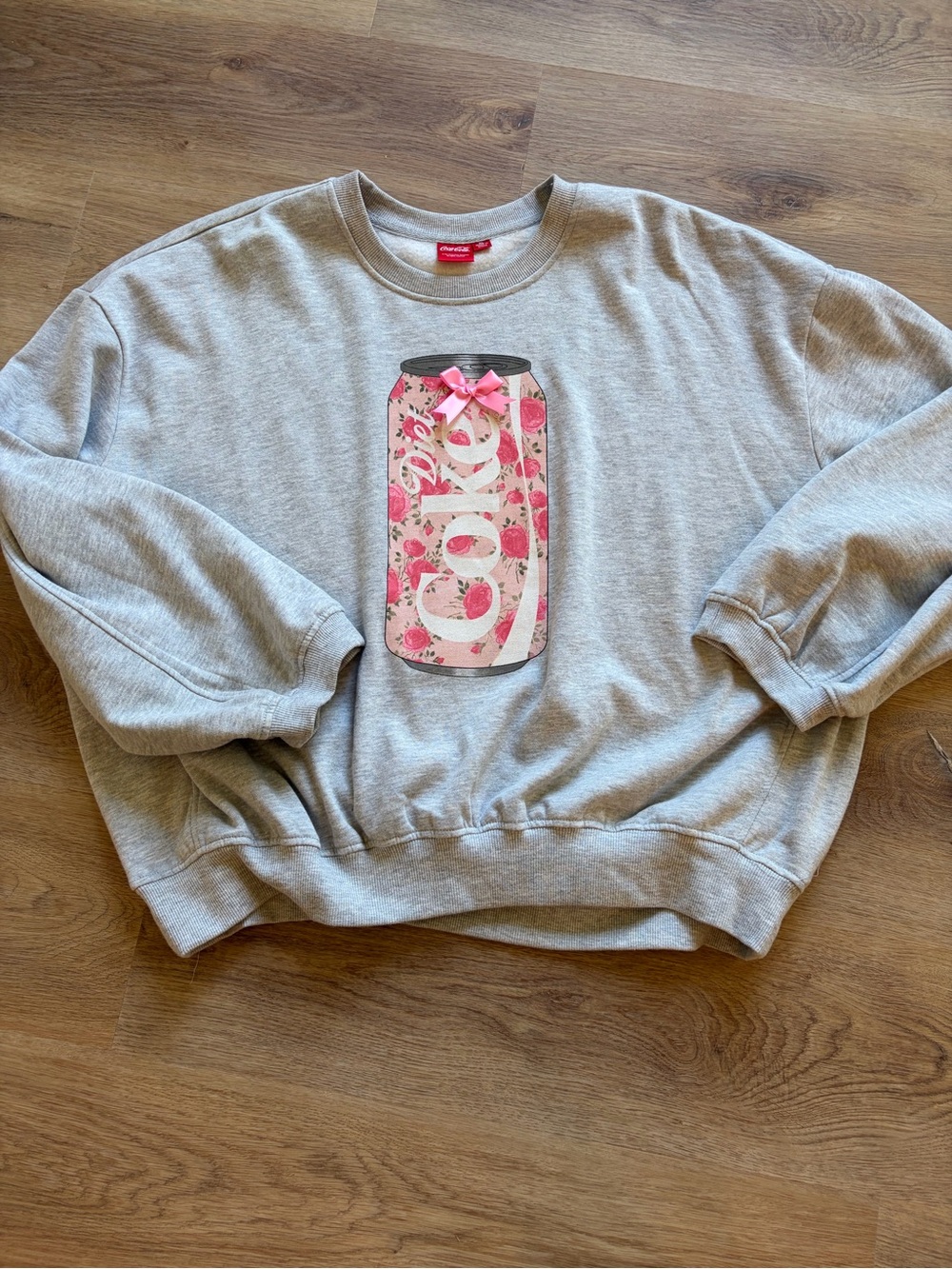 Cute Diet Coke floral and grey sweatshirt.
